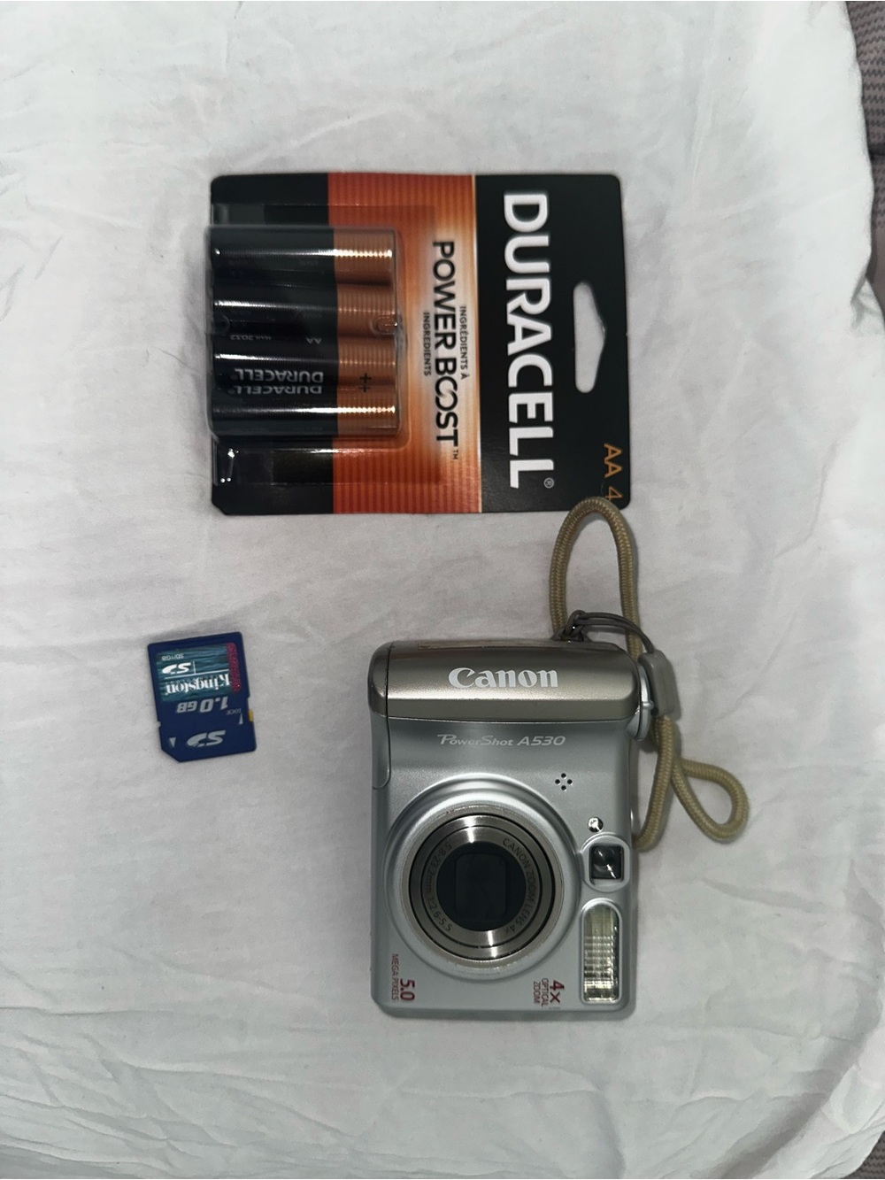 Canon PowerShot A530 Digital Camera in Silver with Wrist Strap - Picture 2 of 3